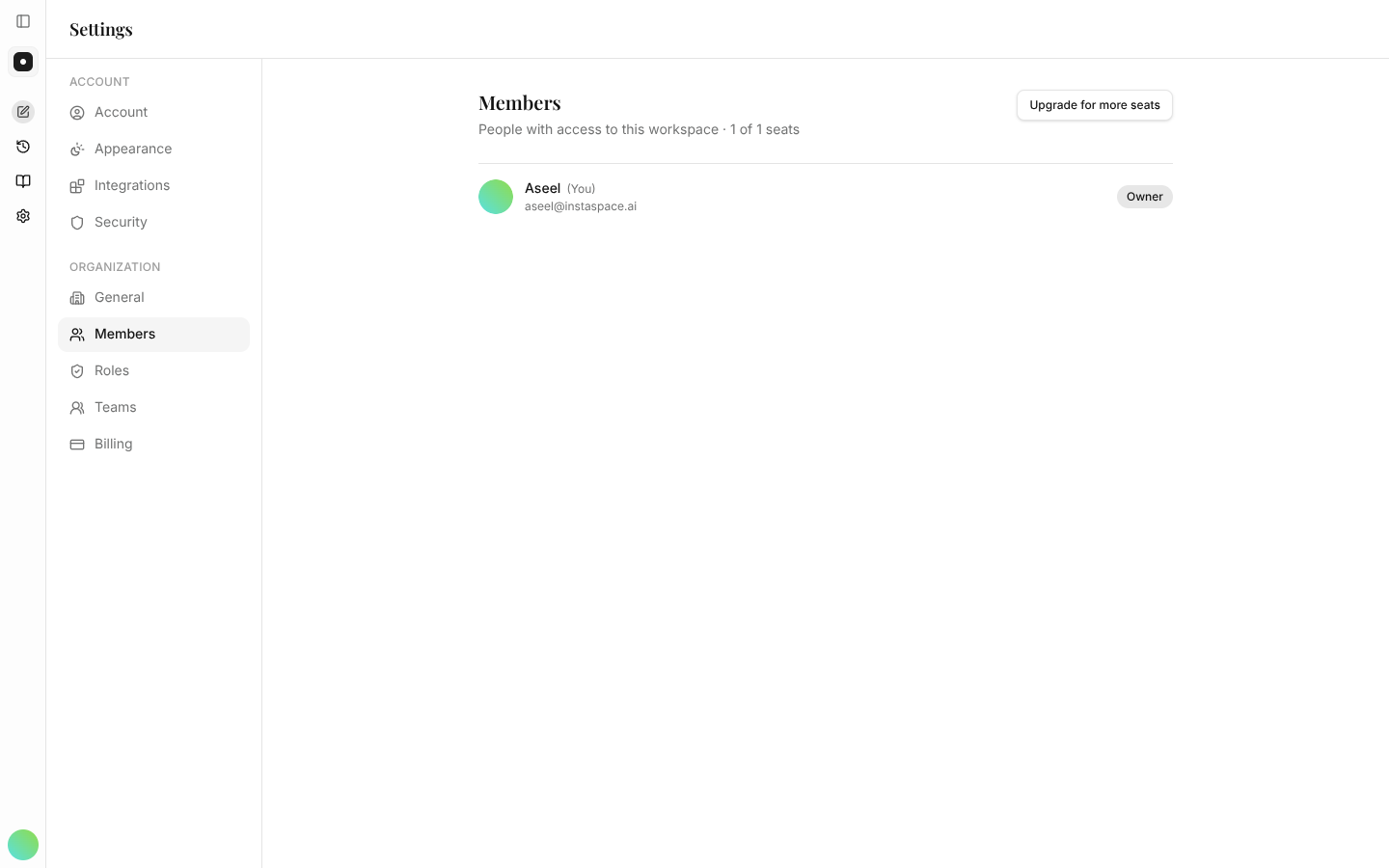 The Members page listing workspace members with their roles and the seats in use.